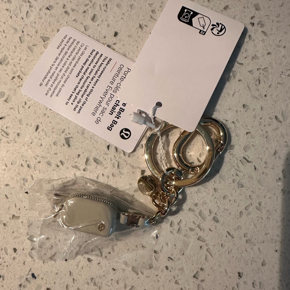 NWT lululemon athletica Gold and Cream Everywhere belt bag keychain
